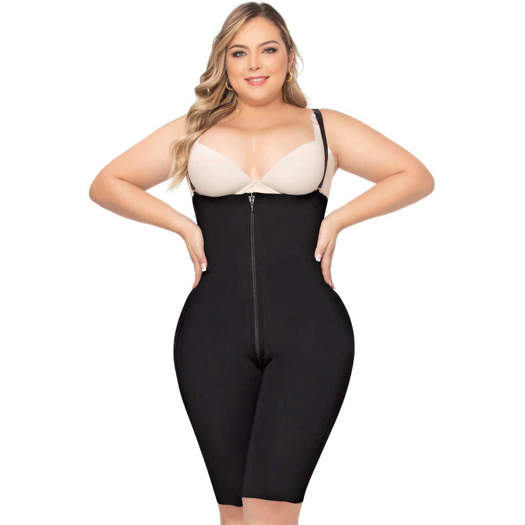 Woman wearing a black shapewear garment on a white background