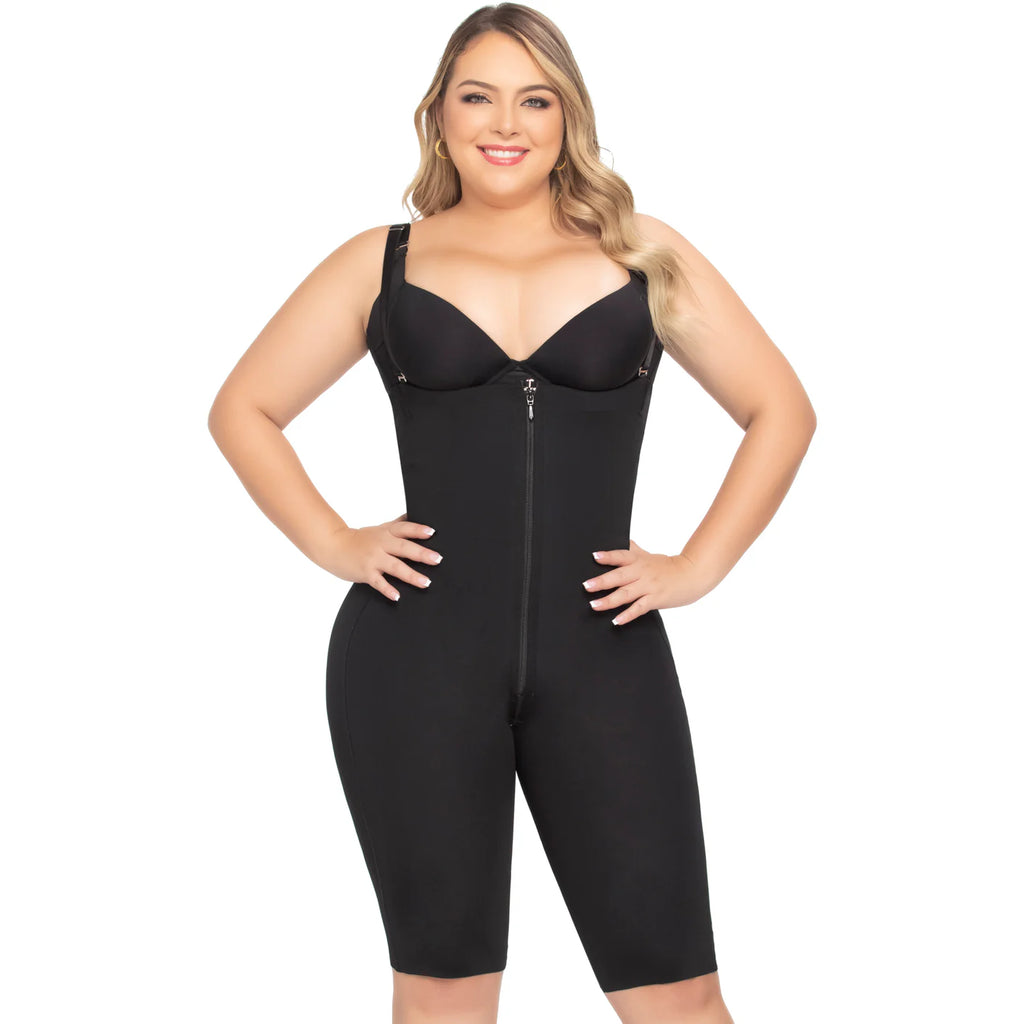 Woman wearing a black compression garment on a white background