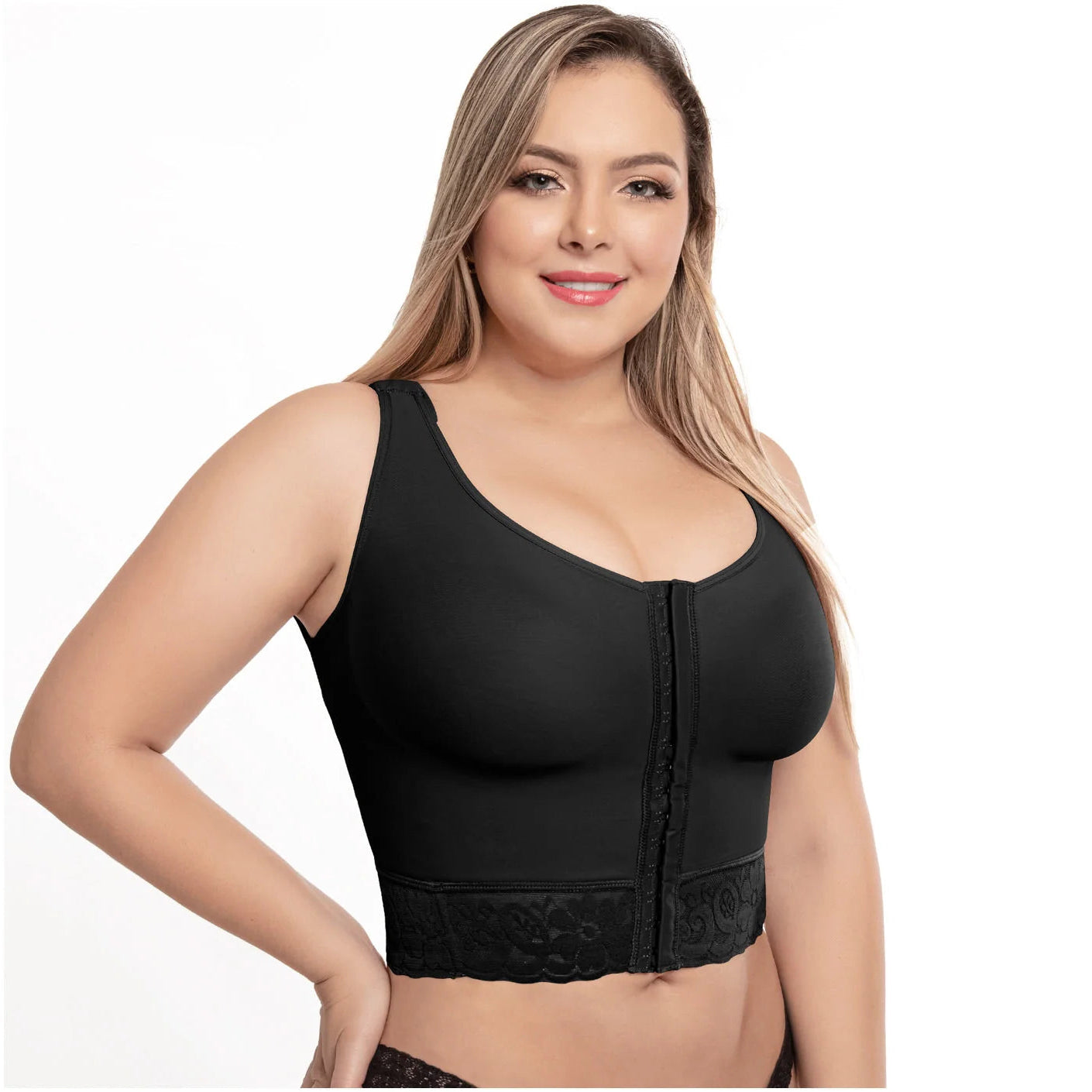 Woman wearing a black compression garment on a white background