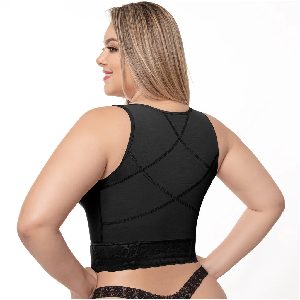Woman wearing a black mesh top on a white background