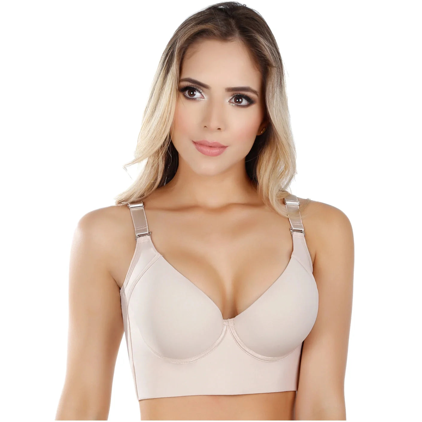 Woman wearing a beige bra on a white background