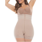 Beige shapewear garment worn by a model on a white background
