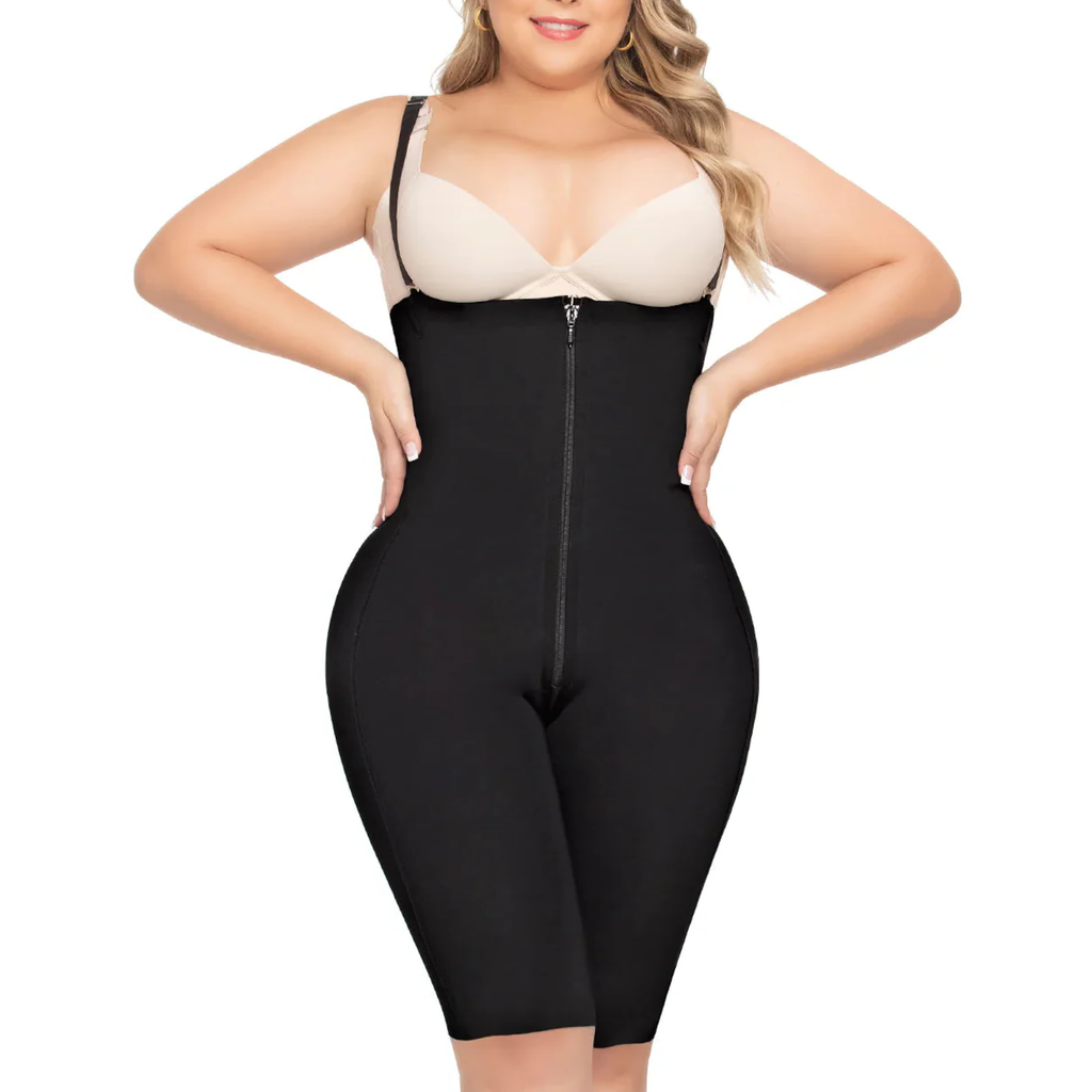 Woman wearing a black shapewear garment on a white background