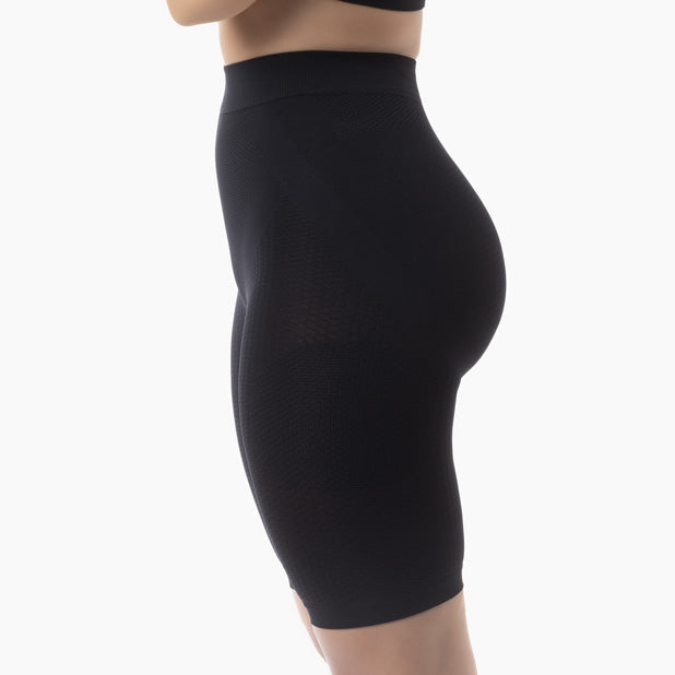 Black shapewear shorts on a white background
