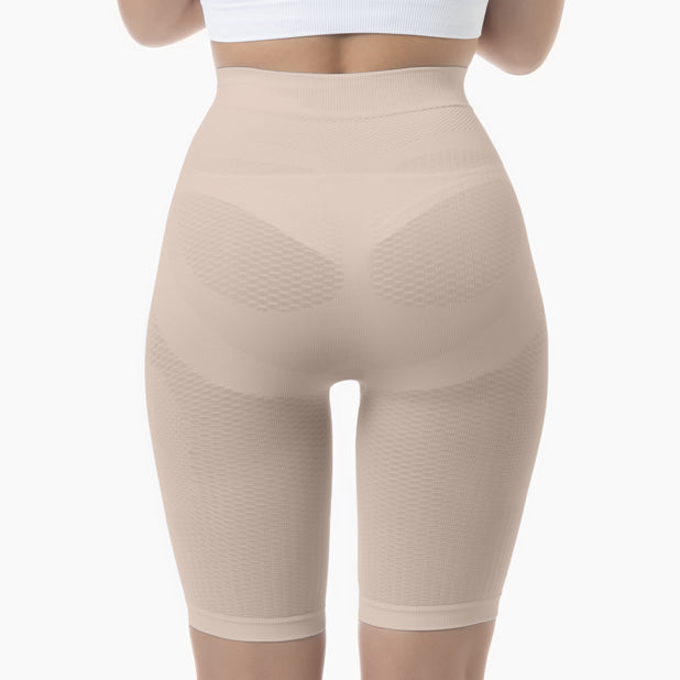 Beige shapewear shorts on a white background