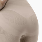 Close-up of beige textured fabric on a white background