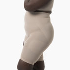Beige shapewear worn by a person on a white background