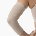 Beige arm sleeve worn by a person on a white background