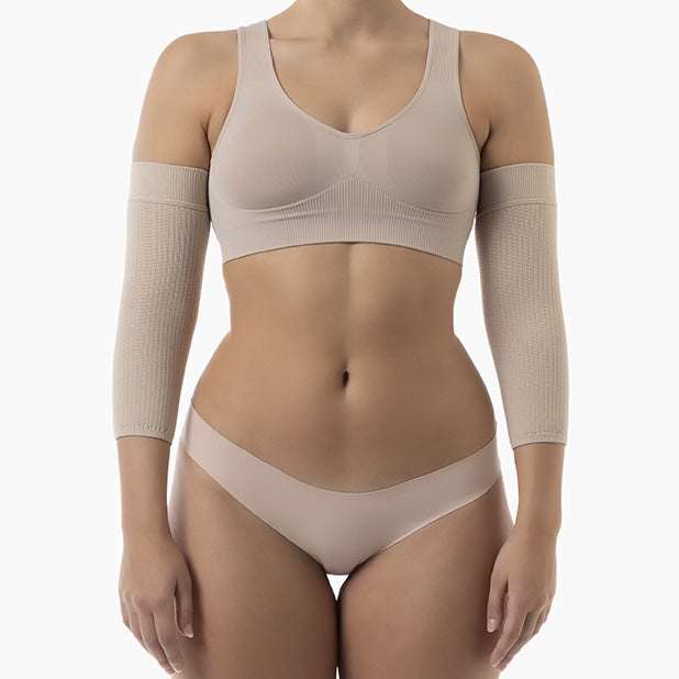 Beige compression garment on a white background