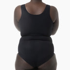 Black tank top and high-waisted underwear set on a white background