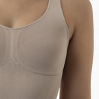 Close-up of a beige tank top on a neutral background