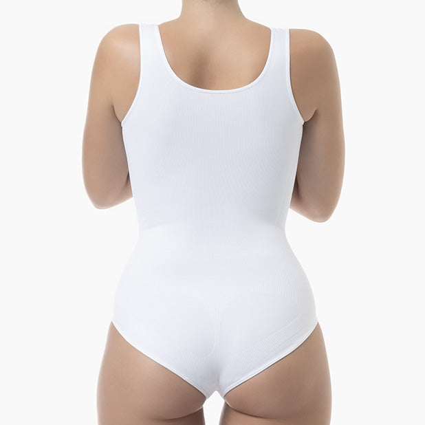 White bodysuit worn by a mannequin on a white background