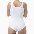 White bodysuit worn by a mannequin on a white background