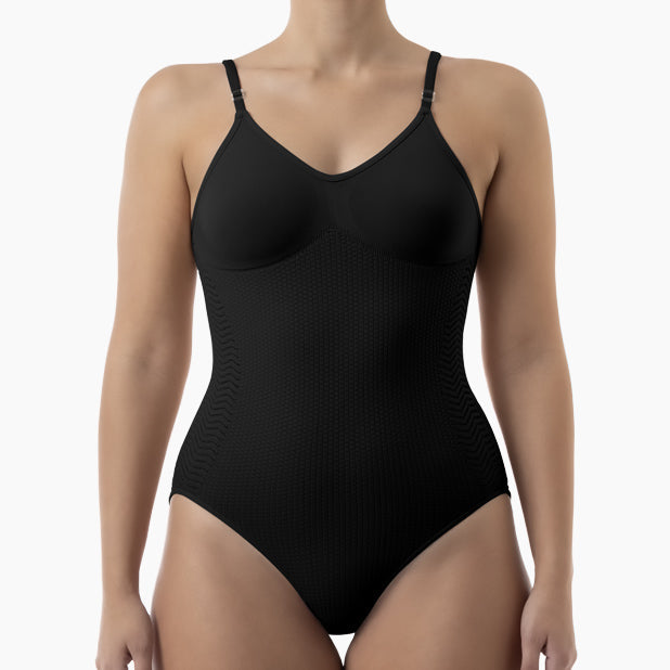 Black bodysuit worn by a model on a white background