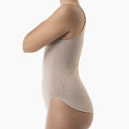Beige compression garment worn by a model on a white background