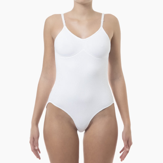 White bodysuit worn by a model on a white background