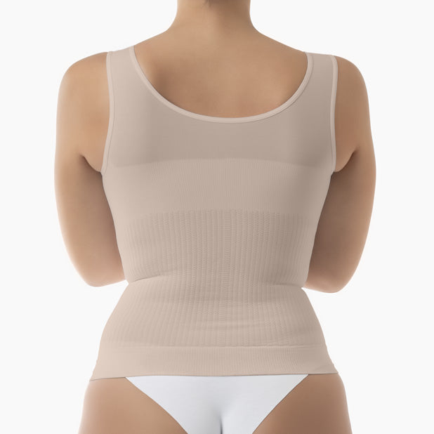 Beige tank top worn by a mannequin on a white background