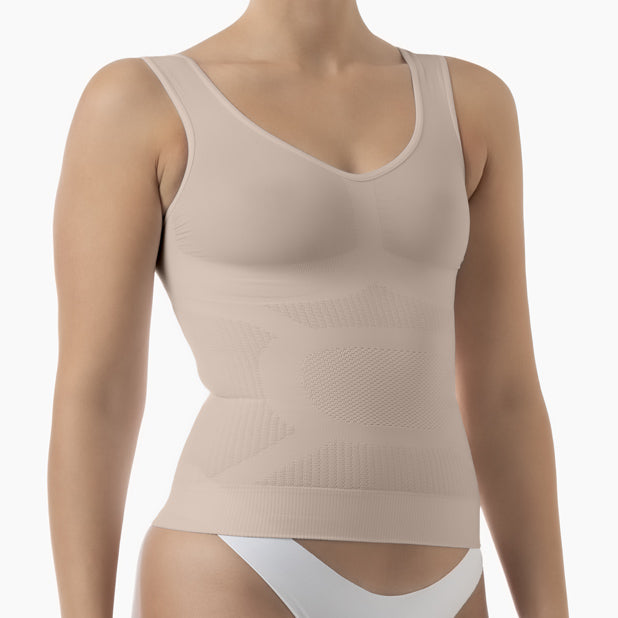 Beige compression tank top on a mannequin against a white background