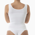 White bodysuit worn by a mannequin on a white background