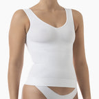 White tank top worn by a mannequin on a white background