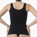 Black tank top worn by a person on a white background