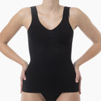 Black bodysuit worn by a model on a white background