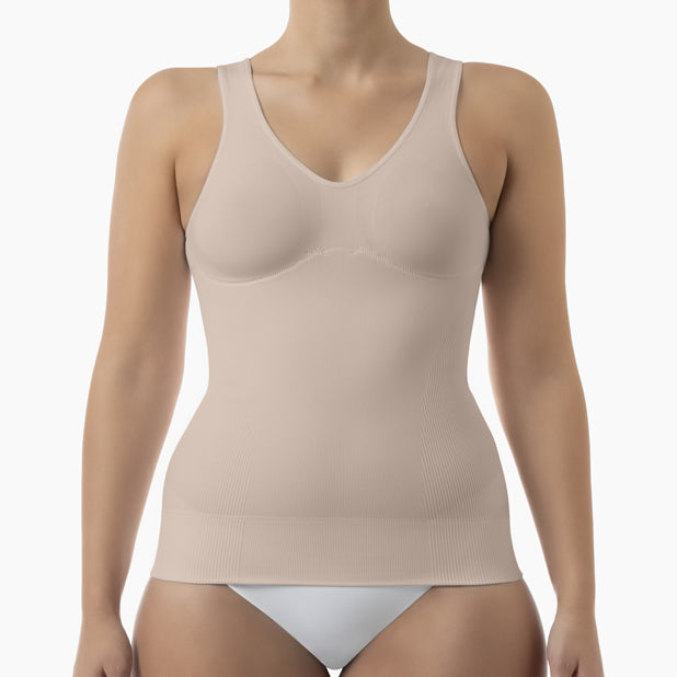 Beige tank top worn by a model on a white background