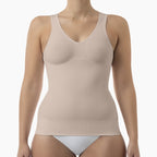 Beige tank top worn by a model on a white background