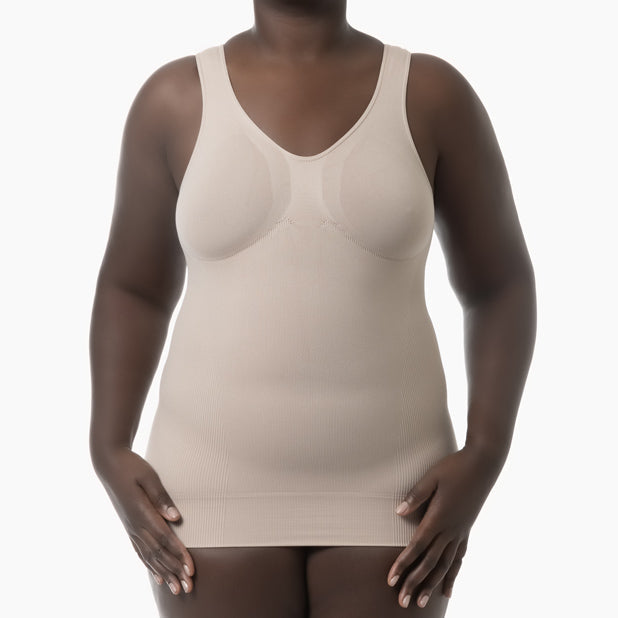Beige tank top worn by a model on a white background