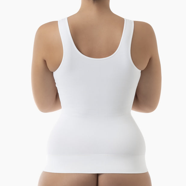 White tank top worn by a person on a white background