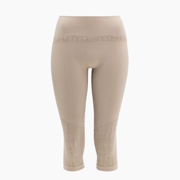 Beige leggings on a white background