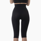 Black leggings worn by a person on a white background