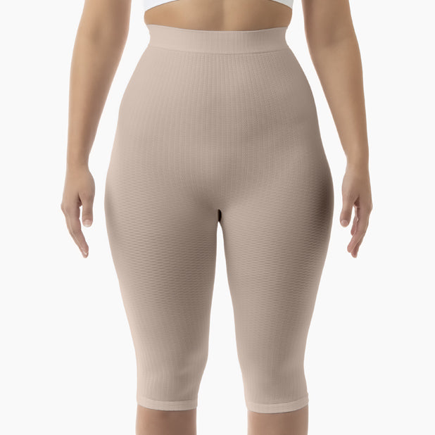 Beige shapewear shorts on a white background
