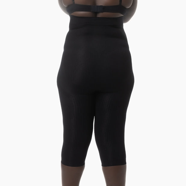 Black high-waisted leggings on a white background