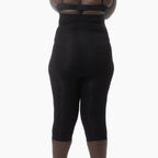 Black high-waisted leggings on a white background