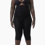 Black shapewear garment on a white background
