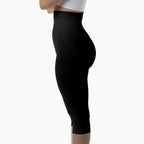 Black leggings worn by a person on a white background