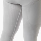 Close-up of gray textured pants on a white background