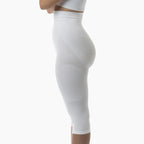 White leggings worn by a person on a white background
