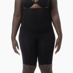 Black shapewear garment on a white background