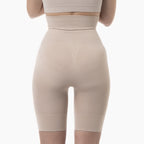 Beige shapewear worn by a person on a white background