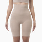 Beige shapewear shorts worn by a person on a white background