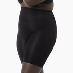 Black shapewear shorts on a white background