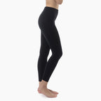 Black leggings worn by a person on a white background