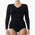 Black long-sleeve bodysuit worn by a model on a white background