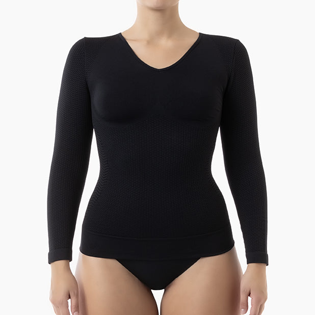 Black long-sleeve bodysuit worn by a model on a white background