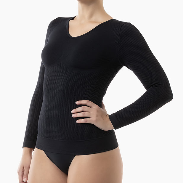 Black long-sleeve bodysuit worn by a person on a white background