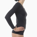 Person wearing a black long-sleeve top on a white background