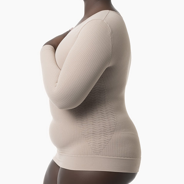 Beige textured sweater worn by a model on a white background