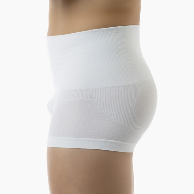 White shapewear worn by a person on a white background